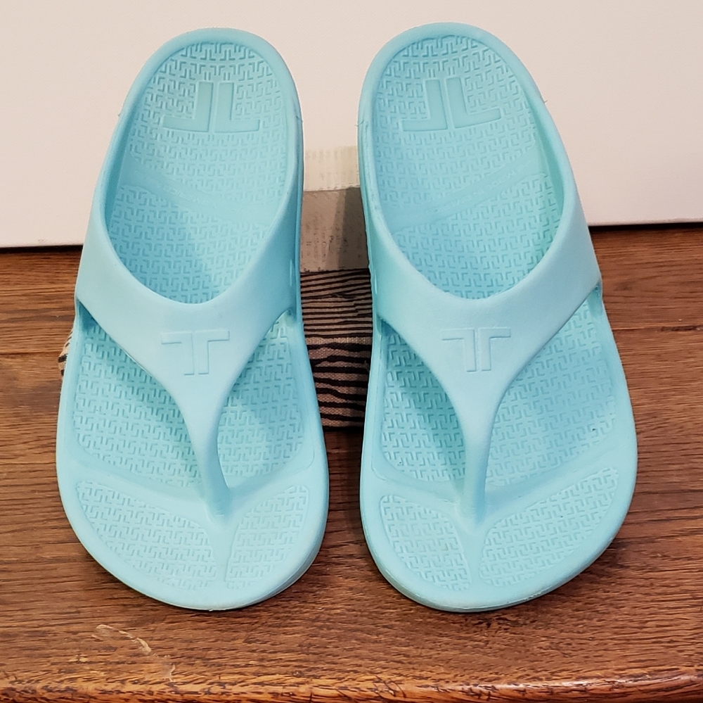 Telic teal blue flip flops